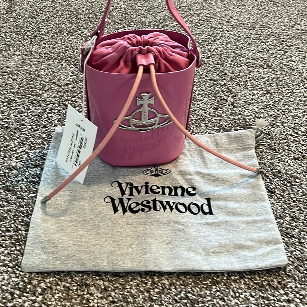 VIVIENNE WESTWOOD
Pink Daisy Drawstring Bucket Bag $600 NWT